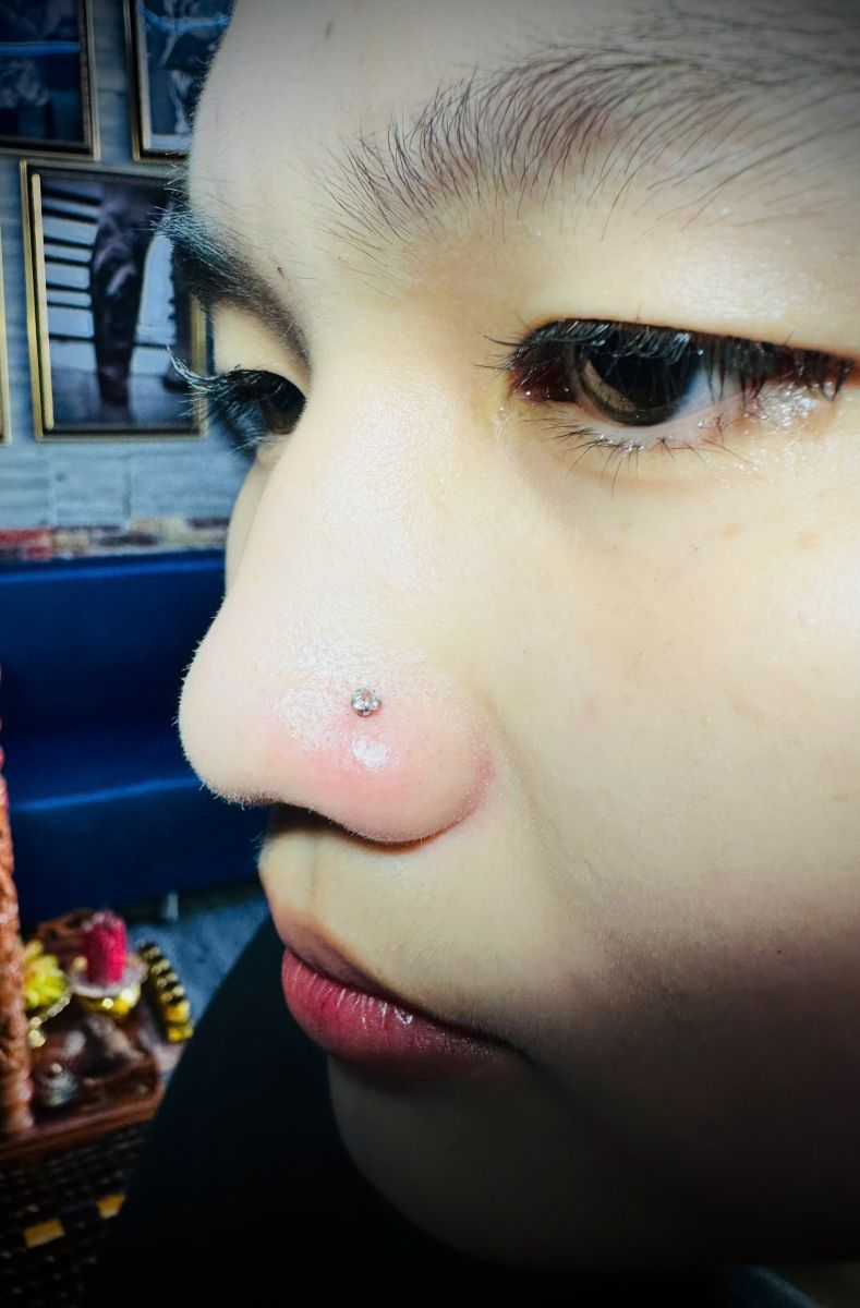 Xỏ khuyên không đau Bình Phước | Quang Louis Tattoo